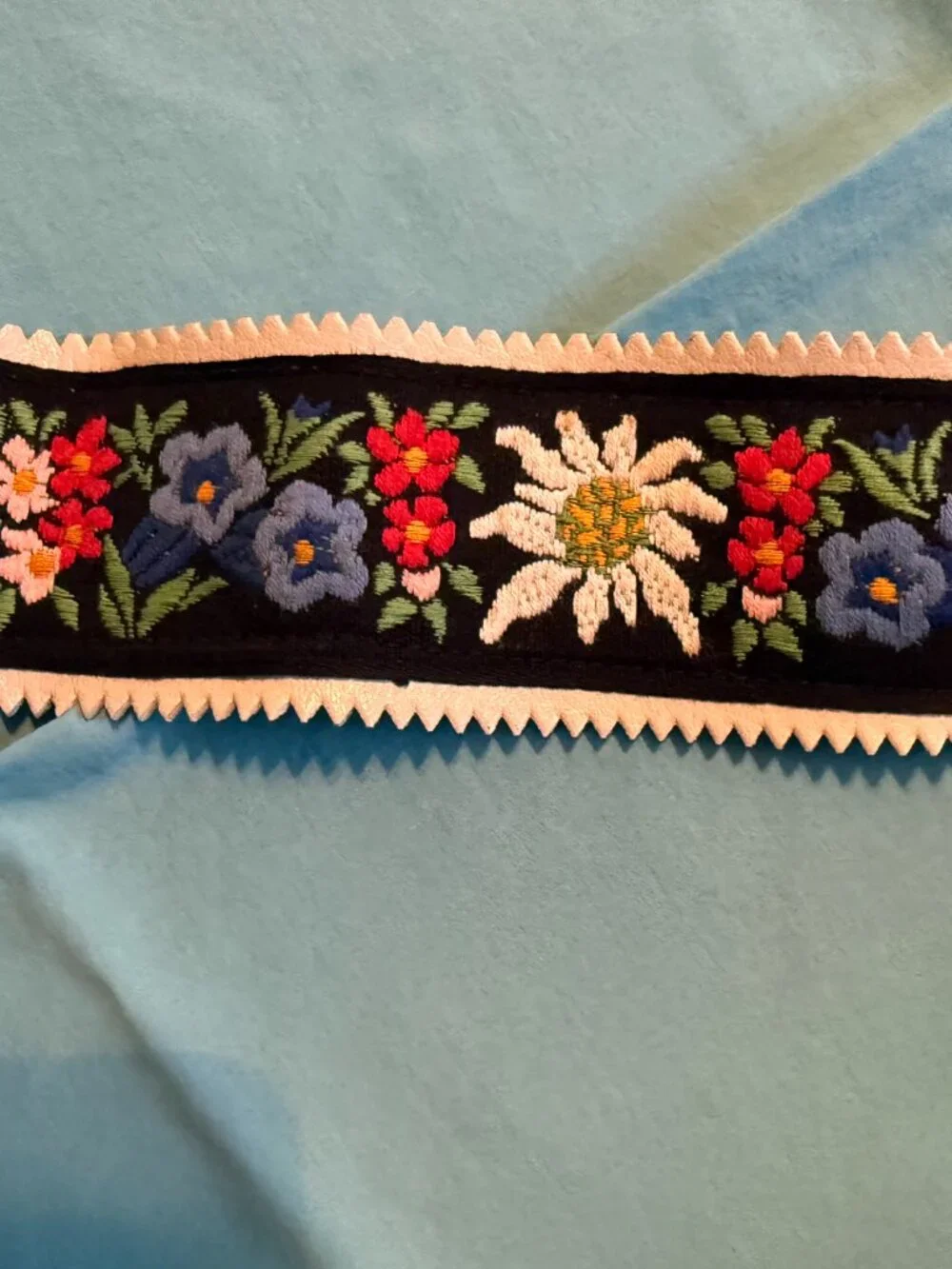 Wide Black Womens' Belt with Embroidered Stylized Flowers and Silver Buckle